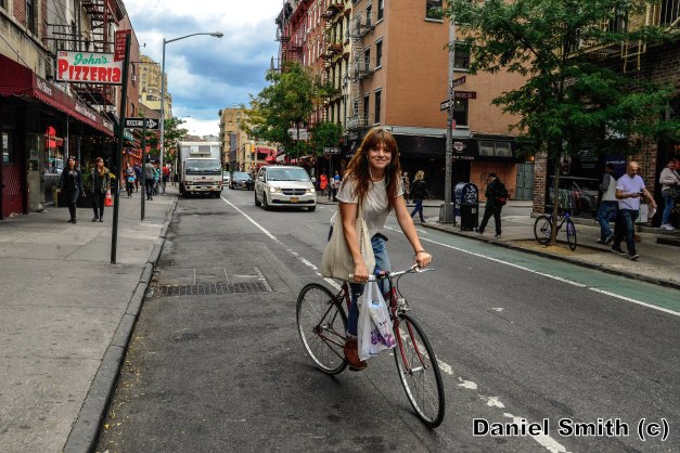 Girl Riding Bike At West Village